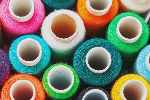 Colorful spools of sewing thread. Colored thread for sewing