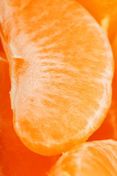 Juicy orange slices of MANDARIN closeup. Macro.