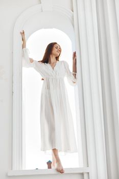 Woman in white dress posing fashion luxury. High quality photo