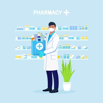 Pharmacist holds paper bag with medicines, drugs and pill bottles inside in hands. Online Home delivery pharmacy service. Doctor in white coat with stethoscope