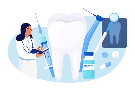 Stomatology, Dentistry Concept. Big Tooth and Professional Instruments for Check Up and Treatment. Dentist Appointment. Doctor Treating Big Unhealthy Teeth with Caries Cavity. Toothache