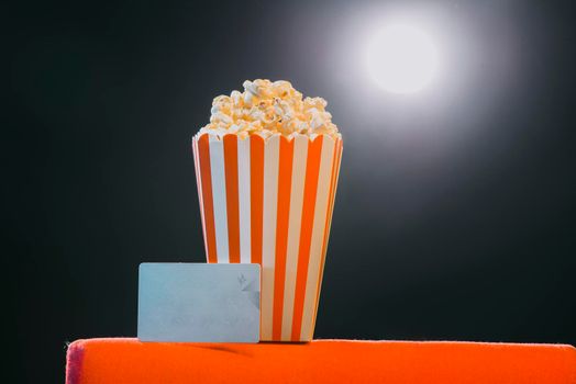 pop corn on armchair cinema