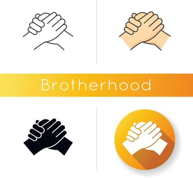 Brotherhood icon. Linear black and RGB color styles. Strong friendship, interpersonal bond between men, Togetherness, unity and fellowship. Manly handshake isolated vector illustrations