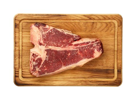 Close up raw beef T-bone steak on wooden board