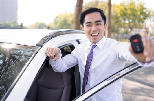 Happy Business Man  showing the car keys