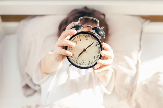 Alarm clock shows time to get up in the morning