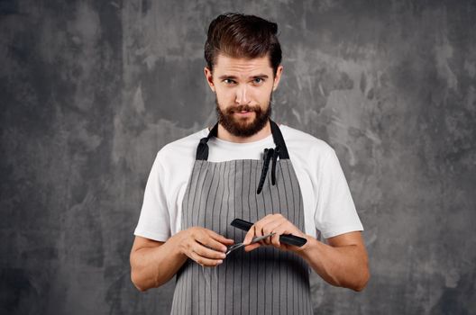 man in apron modern hairstyle fashion Job. High quality photo