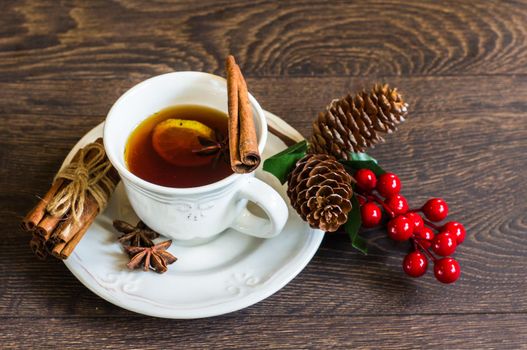 Spiced tea on rustic background