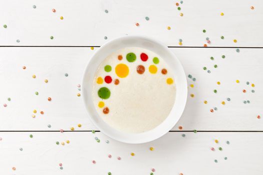 Sweet semolina pudding with toppings served for kids