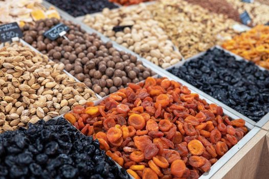 Dried fruits and nuts on food market