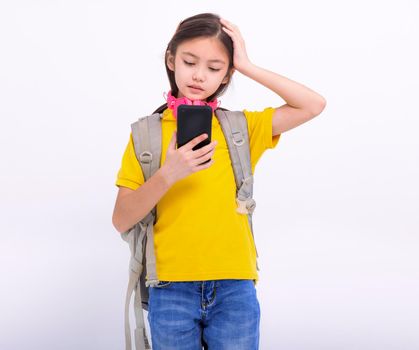 Confused student girl looking at smartphone . isolated on white background