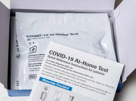 Morgantown, WV - 2 February 2022: Box of the federally supplied at-home test for Covid-19 with instructions for use