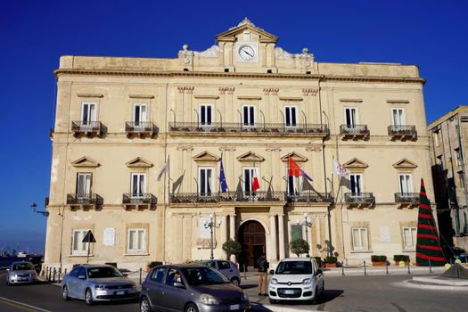 TARANTO, ITALY - DECEMBER 30, 2021: Palazzo di Città, the town hall of the city of Taranto, Puglia, Italy