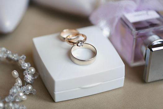 Wedding rings in a beautiful box before the ceremony. Details of the wedding day