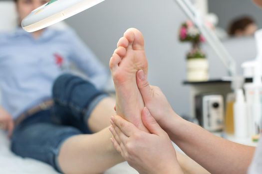 Close up of a foot massage at the spa.