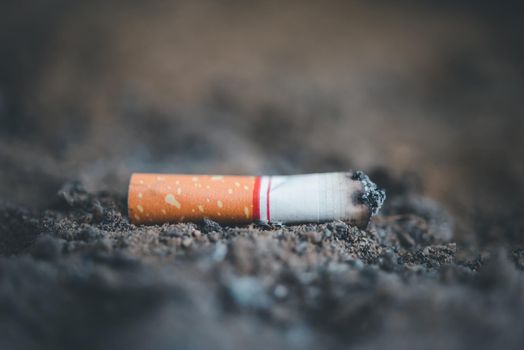 Cigarette burning from smoker addictive nicotine