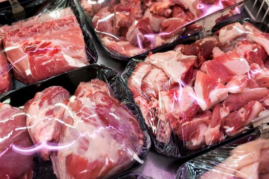 Raw fresh meat, beef or pork in supermarket.