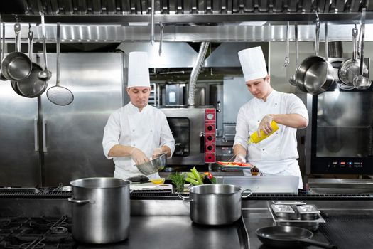 Chefs prepare delicious dishes in the kitchen