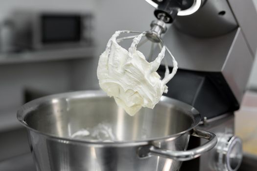 Cream or meringue on the Corolla of the kitchen machine, mixer