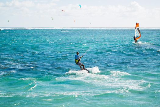 Kitesurfers on the Le Morne beach in Mauritius.