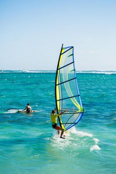 Windsurfers on the Le Morne beach in Mauritius.