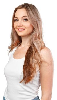 Portrait of young beautiful girl smiling looking at camera over white background