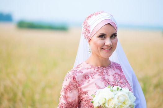 Beautiful female model in traditional bridal costume. Muslim marriage