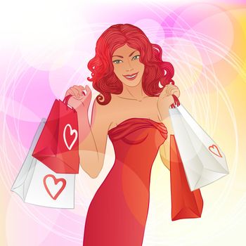 Beautiful redhead woman with shopping bags