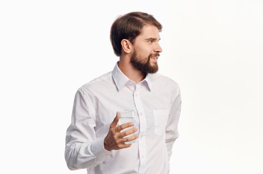 man in white shirt drinking water Studio