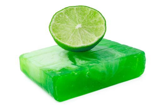 Handmade soap with lime on a white background