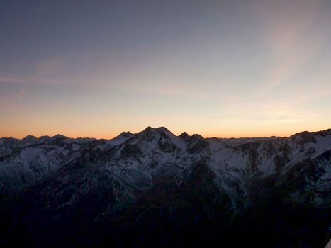 Val Senales panorama of the mountain and the snowy valley at sunset