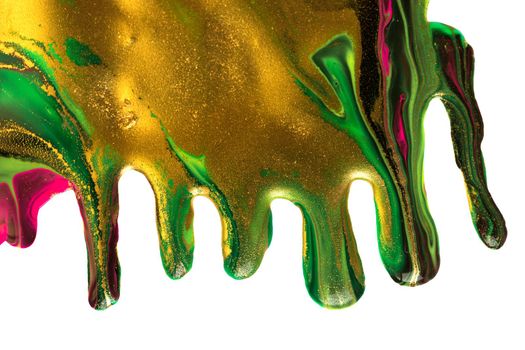 Gold and fluorescent nail polish flowing on white background.