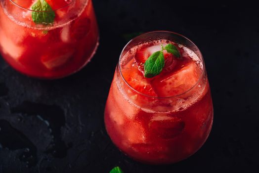 Glasses of cool watermelon and strawberry cocktail
