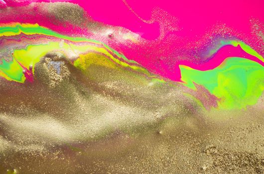 Gold foil texture. Abstract fluorescent ink background.