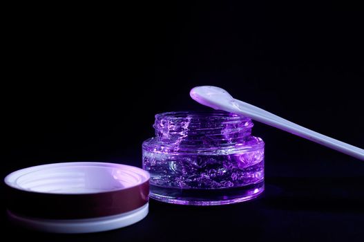 transparent jar with purple color moisturizing gel light