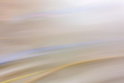 Abstract pastel festive background. Light blur. Oblique lines and waves in beige-blue shades. Horizontal digital banner.