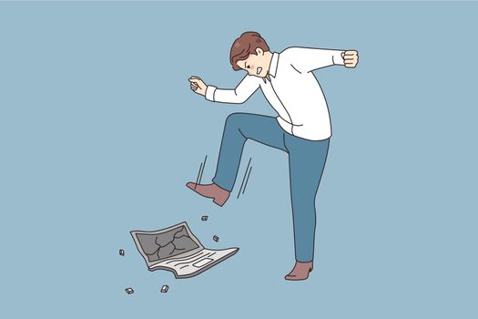 Mad man worker crash laptop overwhelmed with job
