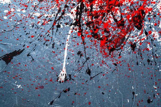 background graphic image. dripping. expression. multicolored spill blemish. black white red. On the concrete texture. Horizontal orientation. top view.