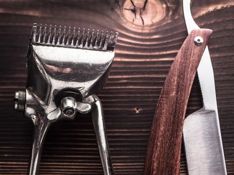 barber tools. vintage clipper straight razor. hairbrush.