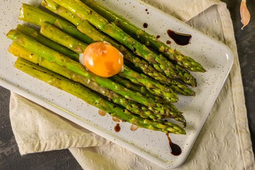 Asparagus cooked with egg 