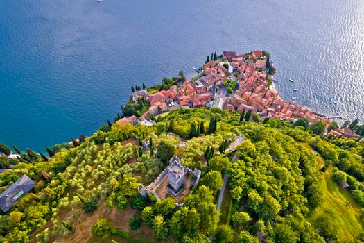Castello di Vezio tower and town of Varenna on Como lake aerial view