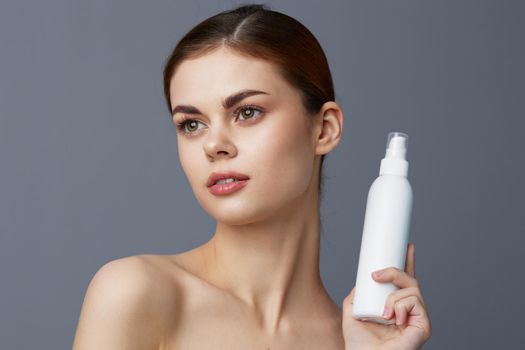 young woman body lotion rejuvenation cosmetics close-up Lifestyle