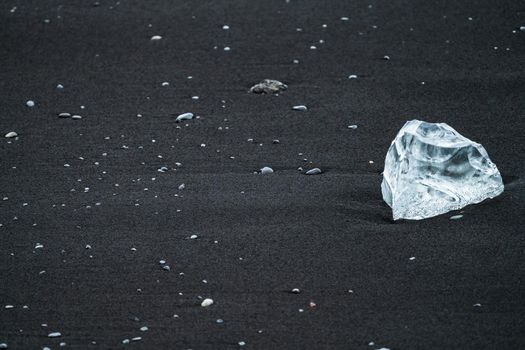 Ice diamond over diamonds beach in Jokulsarlon