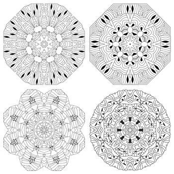 Hand drawn zentangle set of 4 mandalas for coloring page.