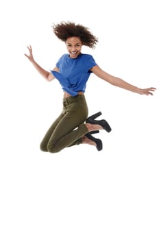 Youthful energy and exuberance. Young african woman jumping with a smile while isolated on white.