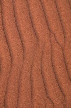 Sand background. Wave of sand texture in desert. Dunes.