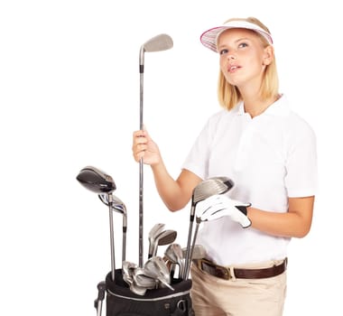 I wonder which one should I use to sink this shot. Studio shot of an attractive young golfer choosing a club from her bag isolated on white.