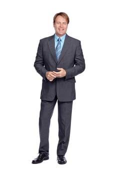 Success is a good look for him. Studio portrait of a well-dressed businessman isolated on white.