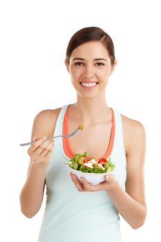 Eat less from the box and more from the earth. Woman against white background ready to eat salad.