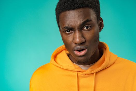 Young black anxious man worried nervous fail problem over mint background
